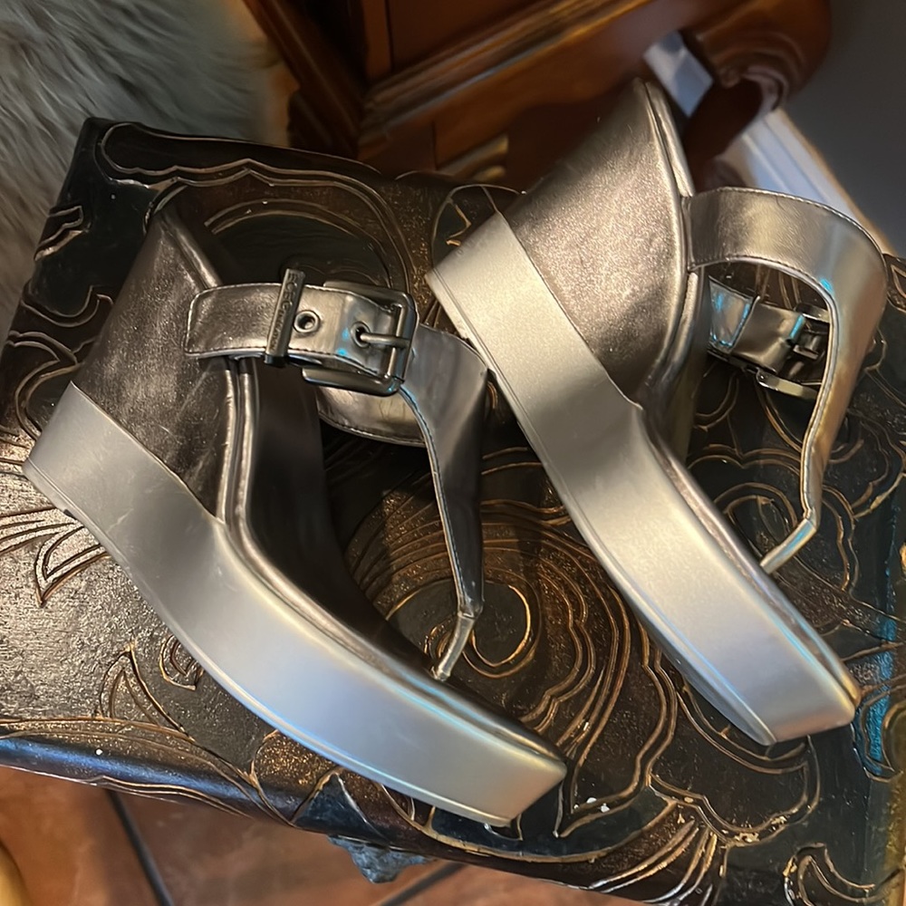 This BCBGeneration Wedge is Silver with a Pewter color combination. 6.5 M - Picture 2 of 7
